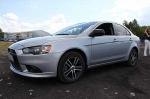 Автомобиль Mitsubishi Lancer серебристый