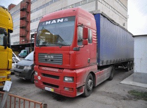 Автомобили грузовые MAN 18460 TGA XXL 2003 Red