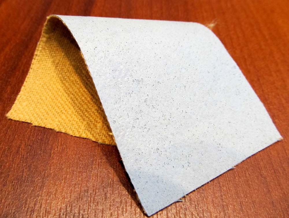 Ткань с резиновым покрытием 100% параарамид.
