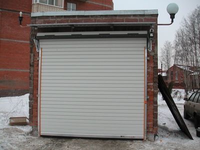 Ворота секционные гаражные  Alutech