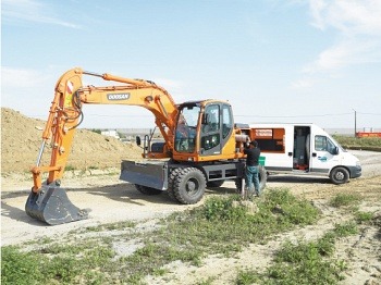 Колесный экскаватор Doosan DX140W